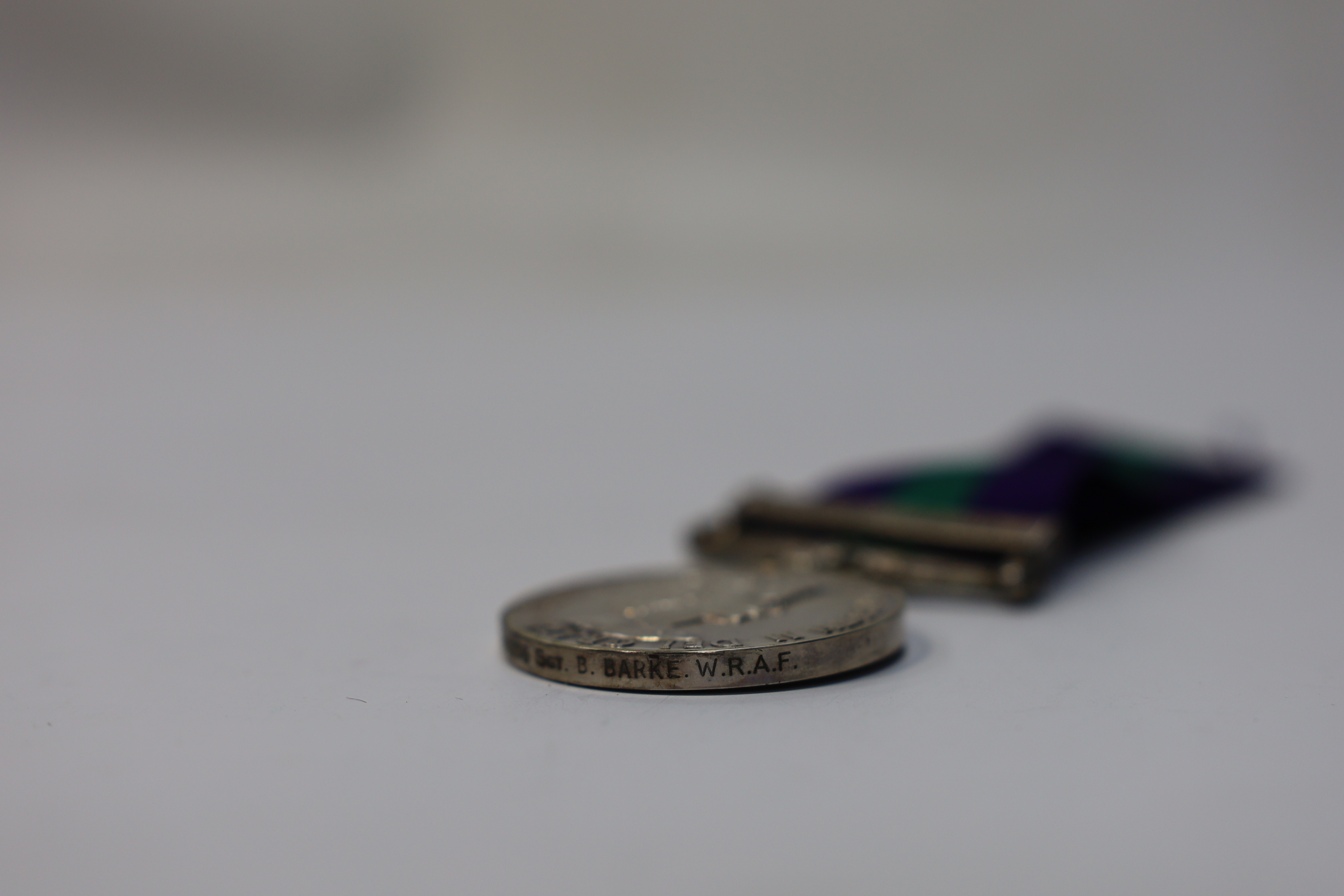 An ERII medal group awarded to SGT. Bertha Barke W.R.A.F. comprising; a General Service Medal with bar for Arabian Peninsula, a Long Service and Good Conduct Medal and a cased British Empire Medal for Meritorious Service